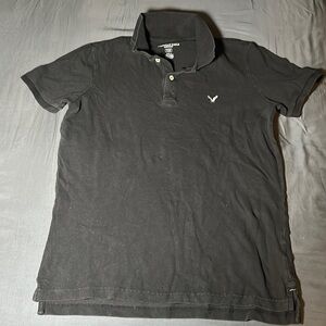 Clean black colored American eagle polo